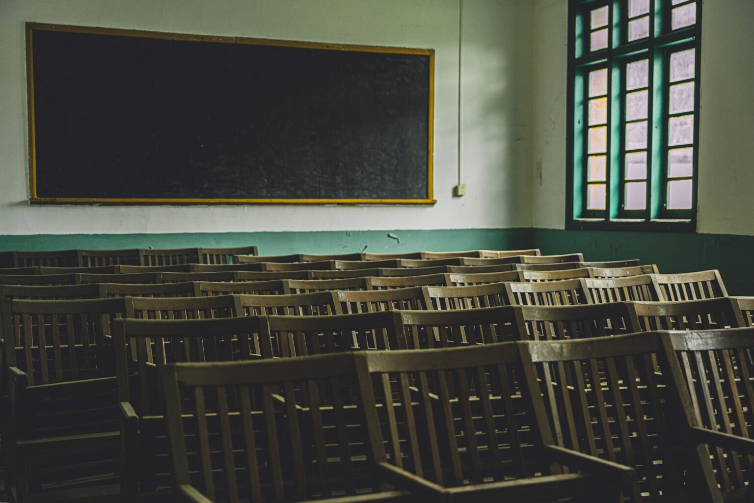 How Corporate Apprenticeship Programs Are Replacing Traditional College Requirements Modern corporate training classroom with employees learning new skills
