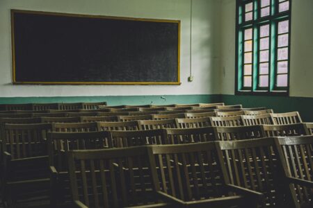 How Corporate Apprenticeship Programs Are Replacing Traditional College Requirements Modern corporate training classroom with employees learning new skills
