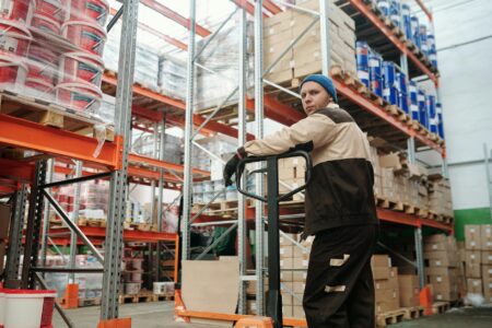 Warehouse interior with organized boxes and inventory stacks