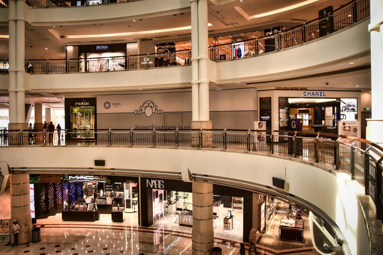 Why Luxury Goods Stocks Are Outperforming During Economic Uncertainty Elegant luxury retail store interior with high-end displays and sophisticated lighting