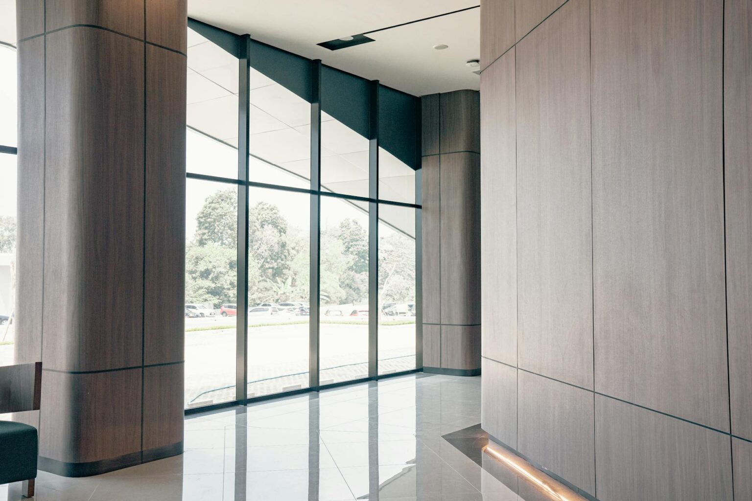 Modern movie theater lobby with comfortable seating and ambient lighting
