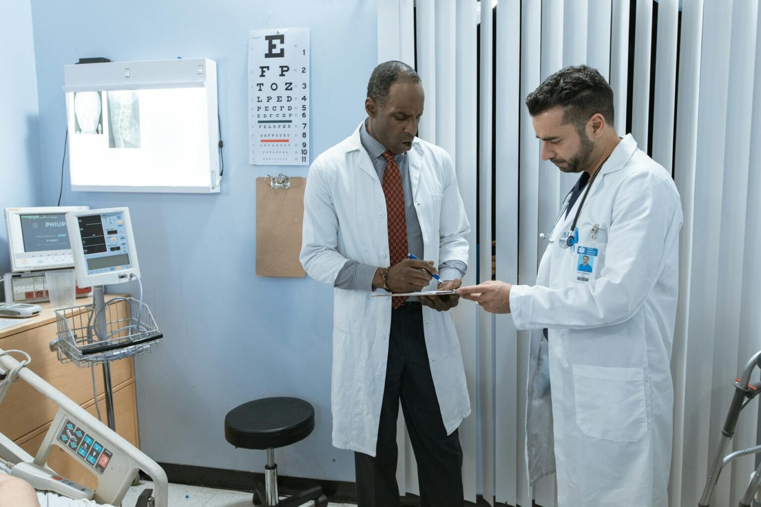 How Medicare Advantage Plan Changes Are Affecting Healthcare Stock Valuations Healthcare professional reviewing medical charts and data analytics on computer screen