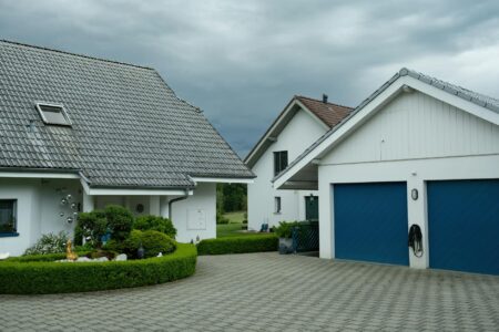 Why Housing Market Corrections Are Accelerating in Former Boom Towns Row of suburban homes showing typical residential development in former boom town markets