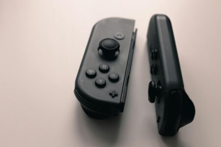 How Netflix’s Gaming Push Is Reshaping Entertainment Stock Valuations Gaming controller on dark surface representing Netflix's expansion into interactive entertainment