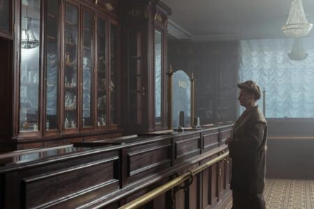 Interior view of modern pharmacy with prescription counters and medication shelves