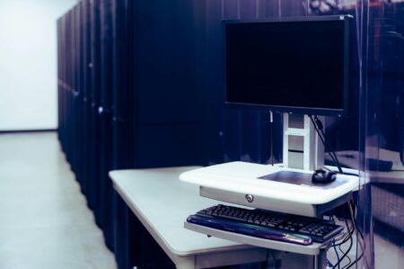 Why Copper Mining Stocks Are Benefiting from AI Data Center Expansion Modern data center with rows of servers requiring extensive copper wiring and cooling infrastructure