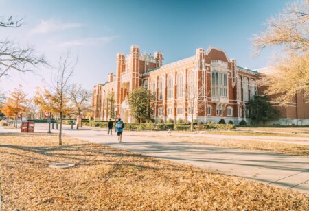 Why Student Housing Investment Trusts Are Outperforming Commercial Real Estate Aerial view of university campus with modern buildings and student housing complexes