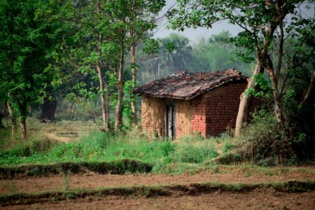 Why Remote Work Tax Incentives Are Attracting Companies to Rural Areas Modern office building in small rural town representing corporate relocation to rural areas