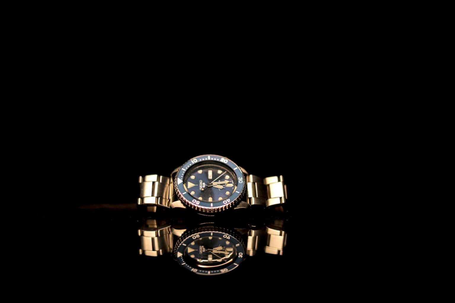 Why Luxury Watch Investment Funds Are Outperforming Traditional Stock Portfolios Collection of luxury watches displaying various brands and complications on dark surface