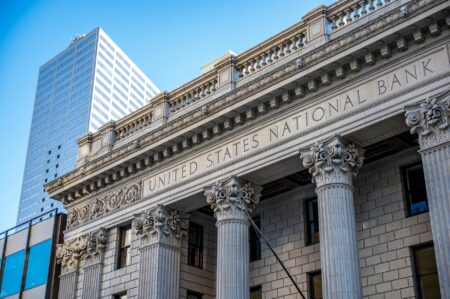 Why Regional Bank Mergers Are Accelerating in Secondary Markets Modern community bank building exterior with traditional architecture
