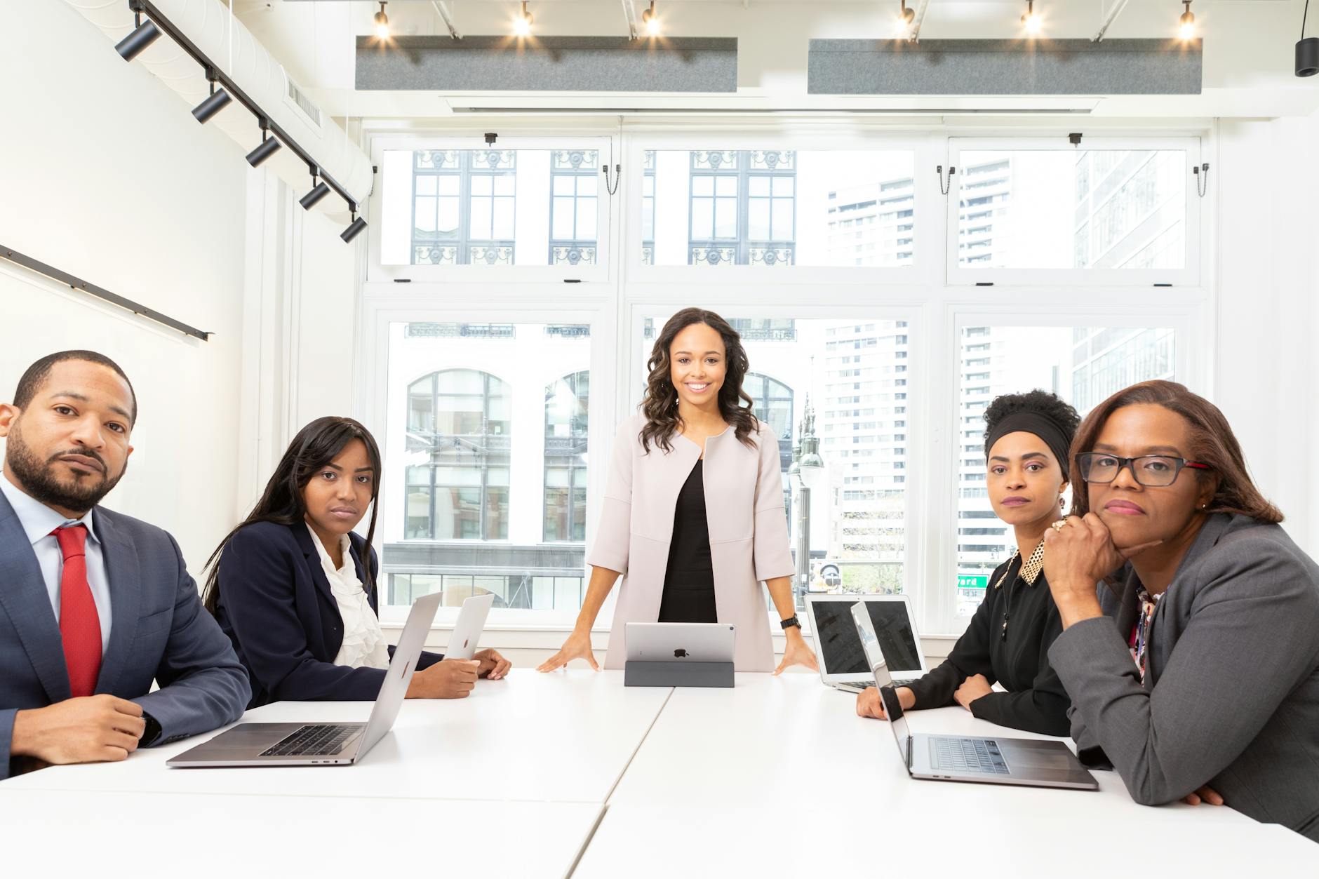 Professional business meeting with executives discussing strategy and planning
