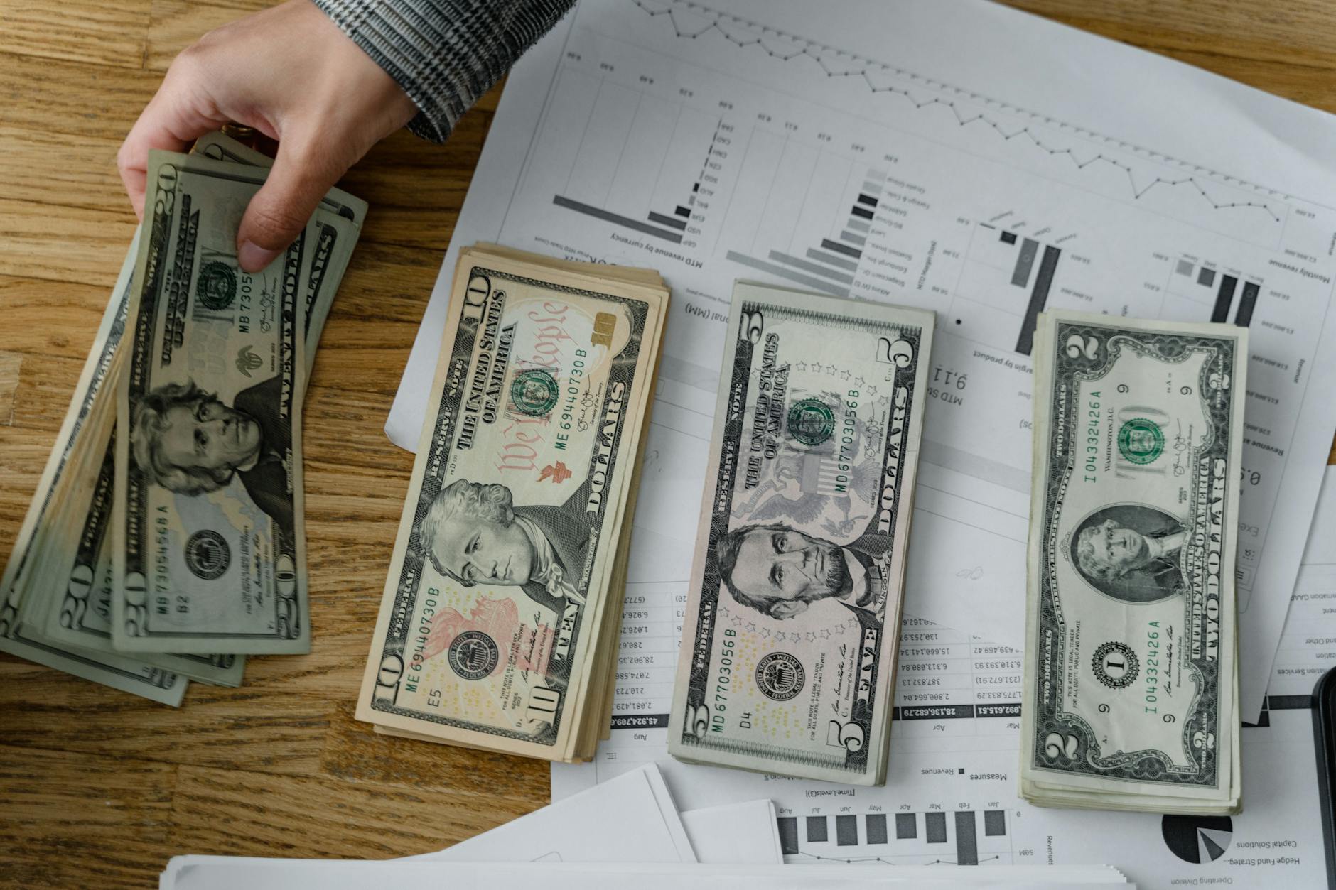 Stack of cash representing corporate cash reserves and financial liquidity