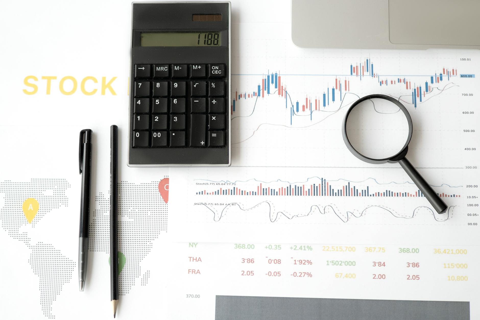 Business professionals analyzing financial charts and investment data