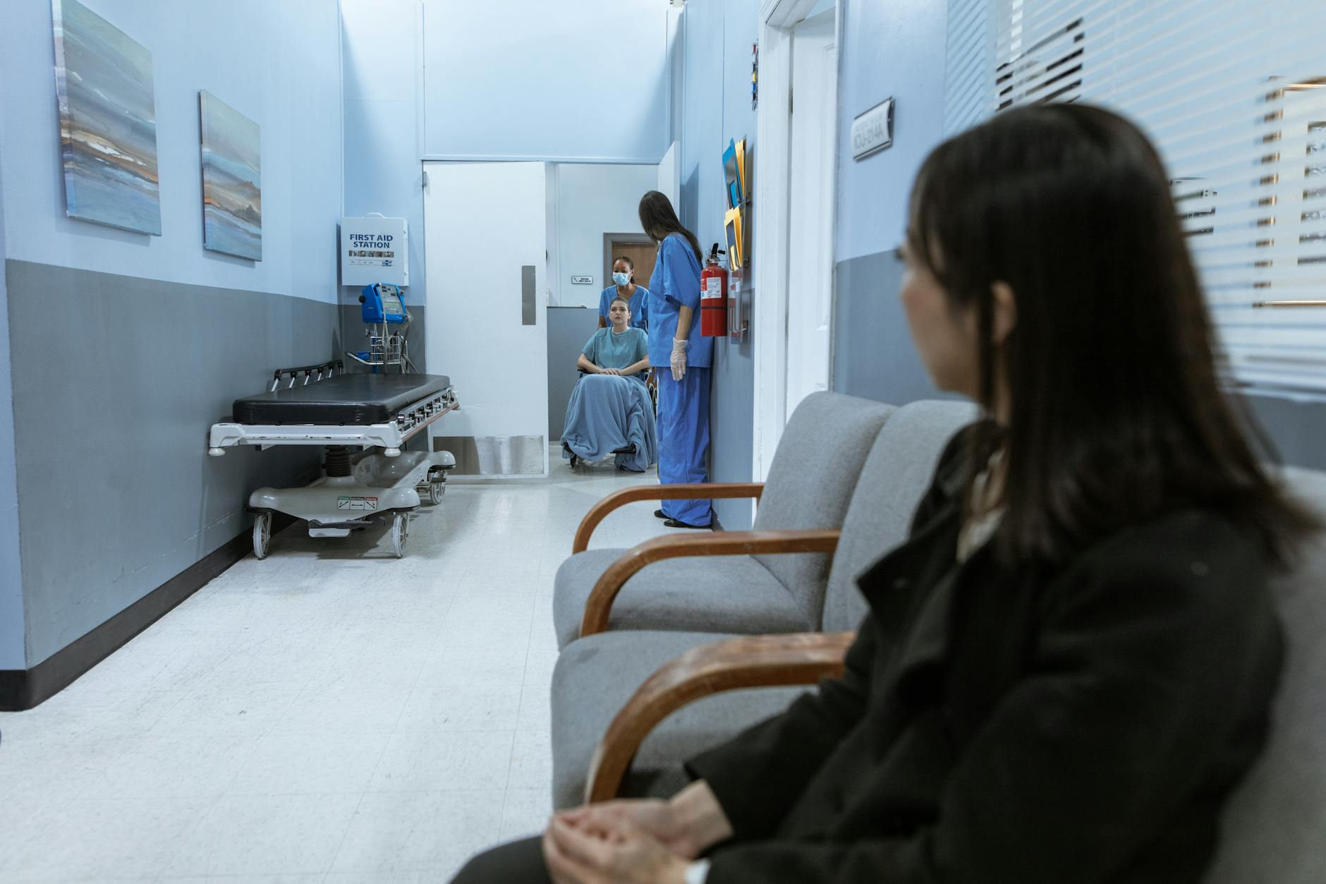 Modern hospital corridor with medical equipment and healthcare facility infrastructure