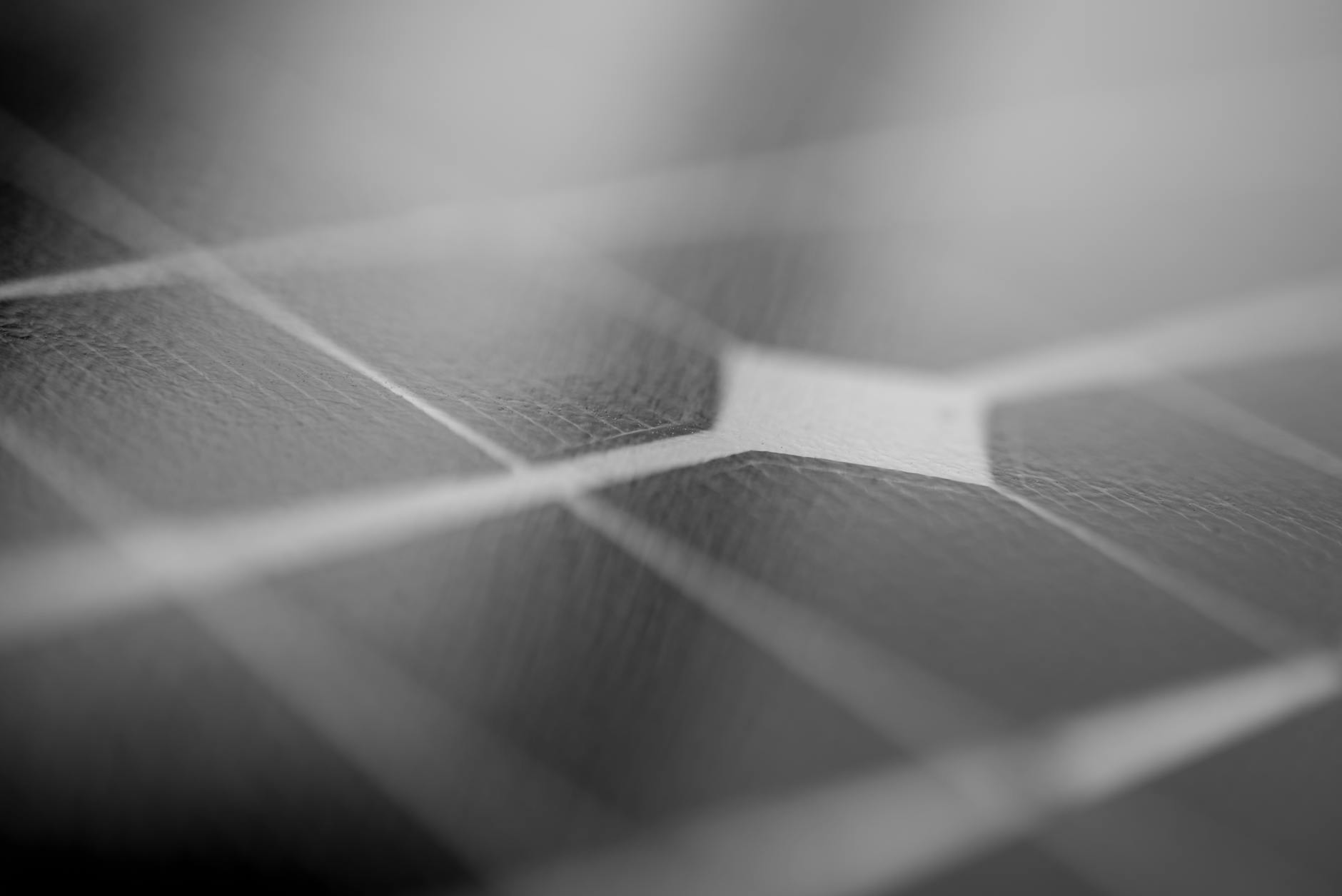 Solar panel installation on commercial building roof generating clean energy