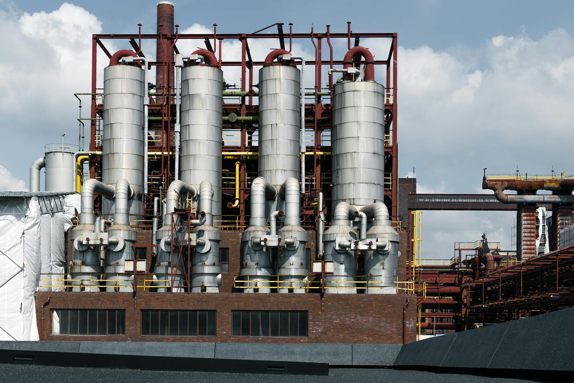 Modern industrial processing facility with metal structures and equipment