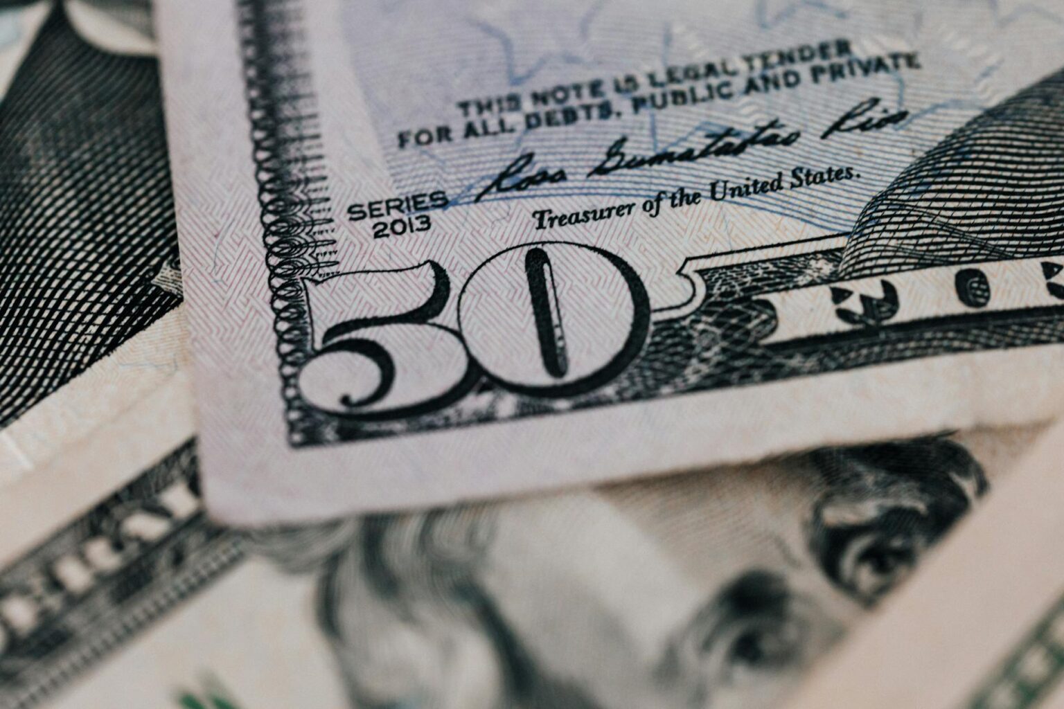 Treasury Yield Curve Steepening Is Signaling Recession Bets Again U.S. Treasury bonds and financial documents representing yield curve analysis