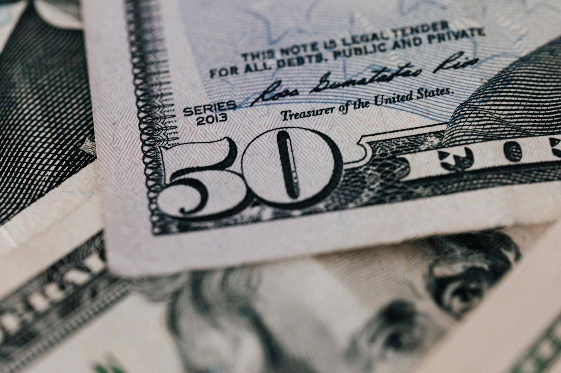 U.S. Treasury bonds and financial documents representing yield curve analysis
