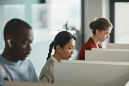 Corporate America’s Quiet Shift Away from Open Office Layouts Modern office interior showing transition from open floor plan to private workspaces