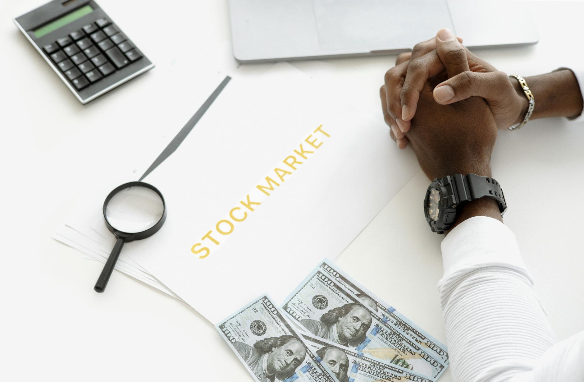 Stock exchange trading floor with financial data displays