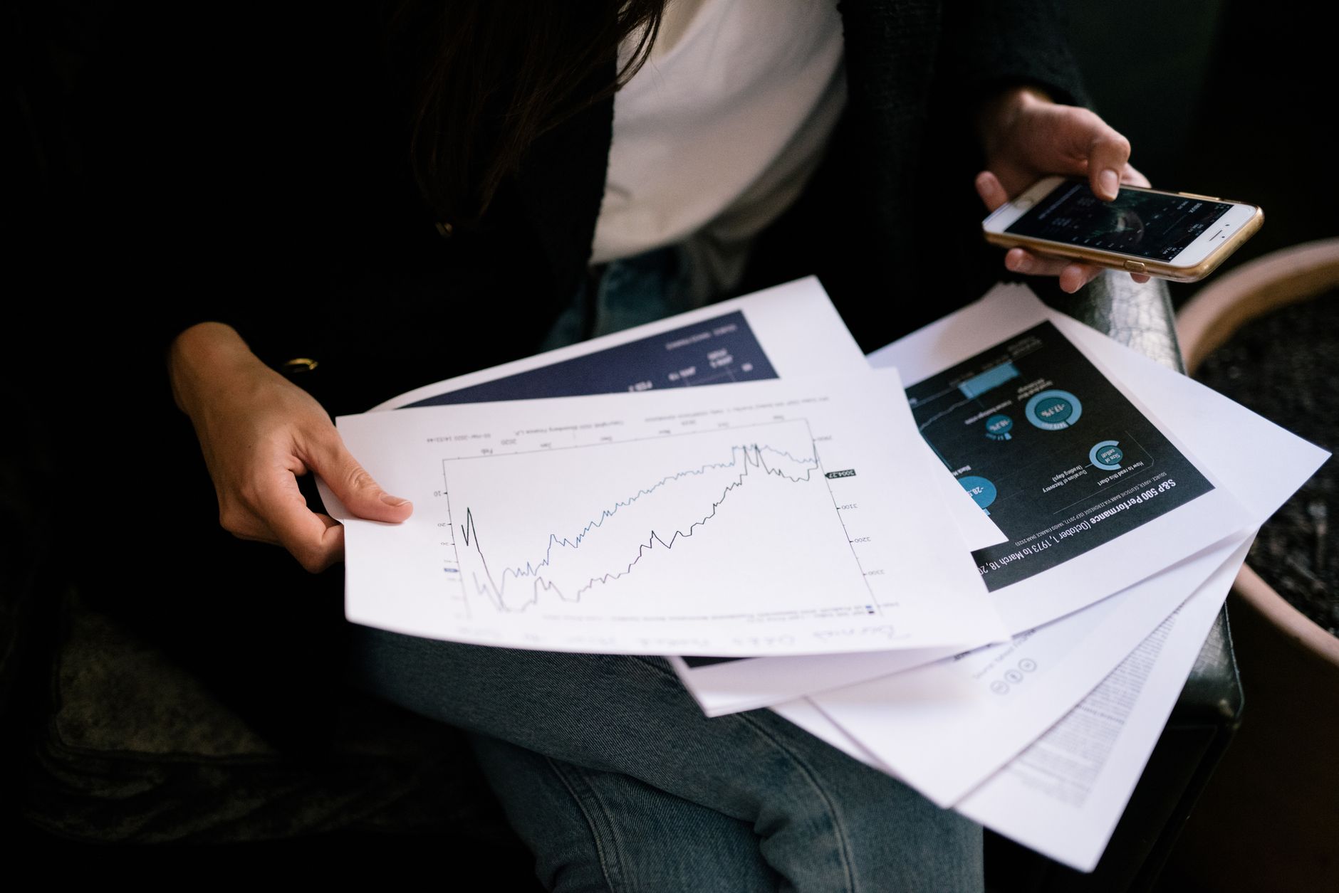 Credit risk graphs and financial data on screen representing CLO market analysis