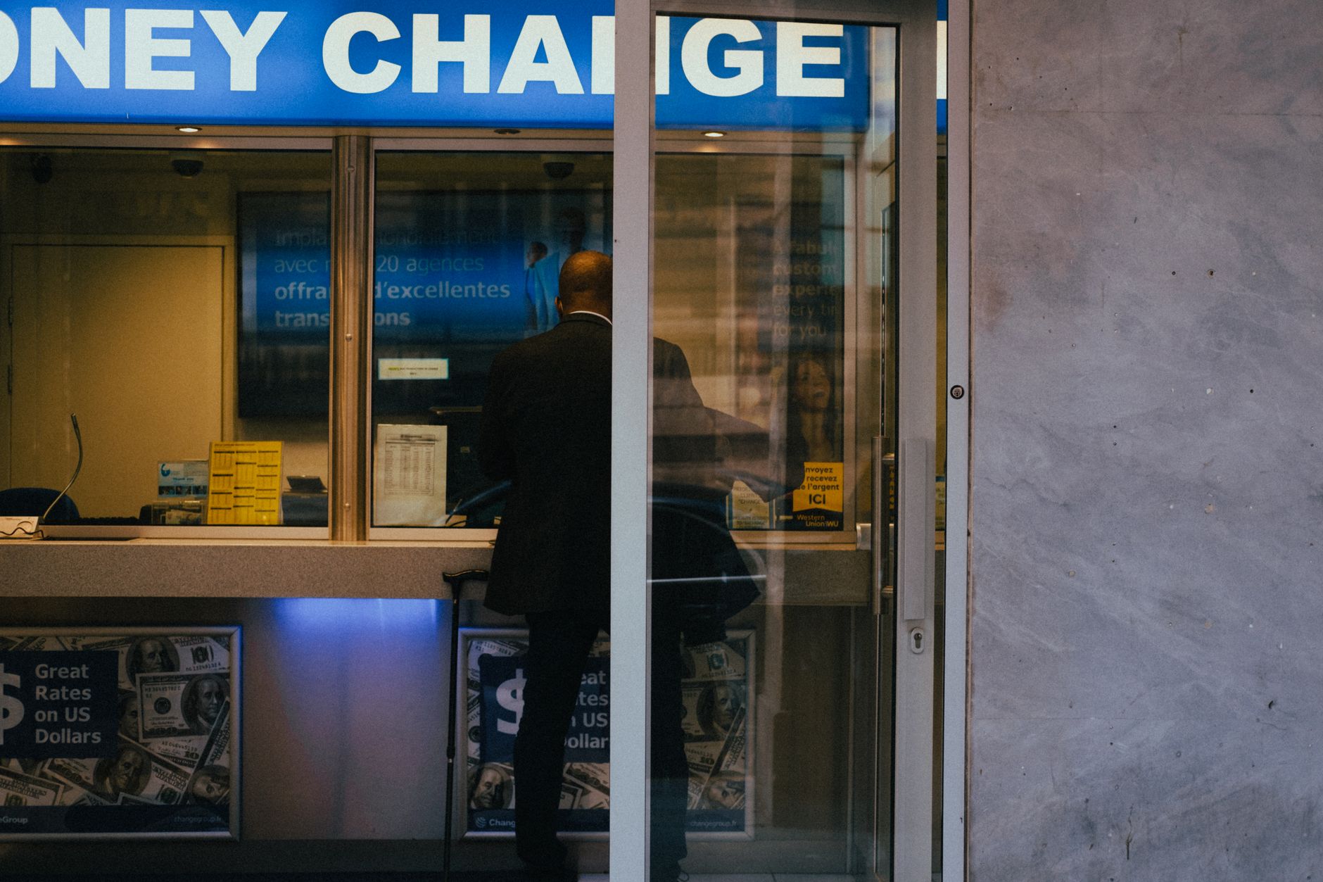 Currency exchange board showing dollar and foreign currency rates