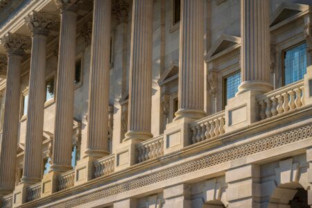 Government building exterior with columns representing state and municipal finance