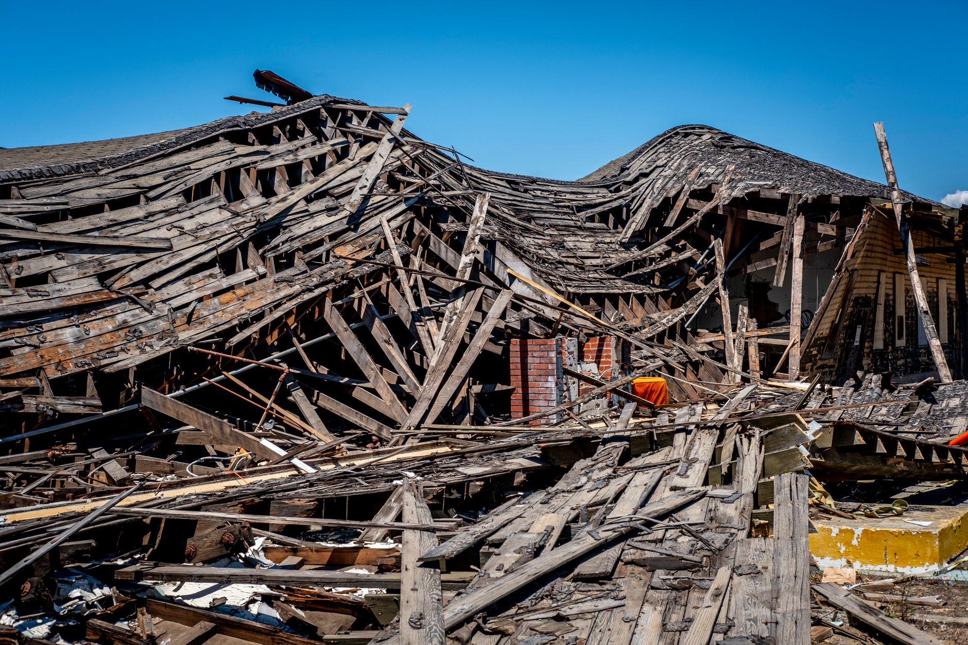 Aerial view of coastal destruction caused by a hurricane, illustrating catastrophe risk