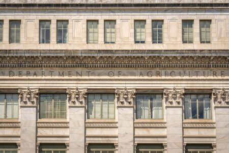 Exterior of a central bank building representing Federal Reserve monetary policy decisions