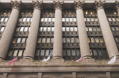 Municipal Bond Insurance Is Quietly Regaining Ground After Years of Dormancy Exterior of a government municipal building representing municipal bond issuance and public finance