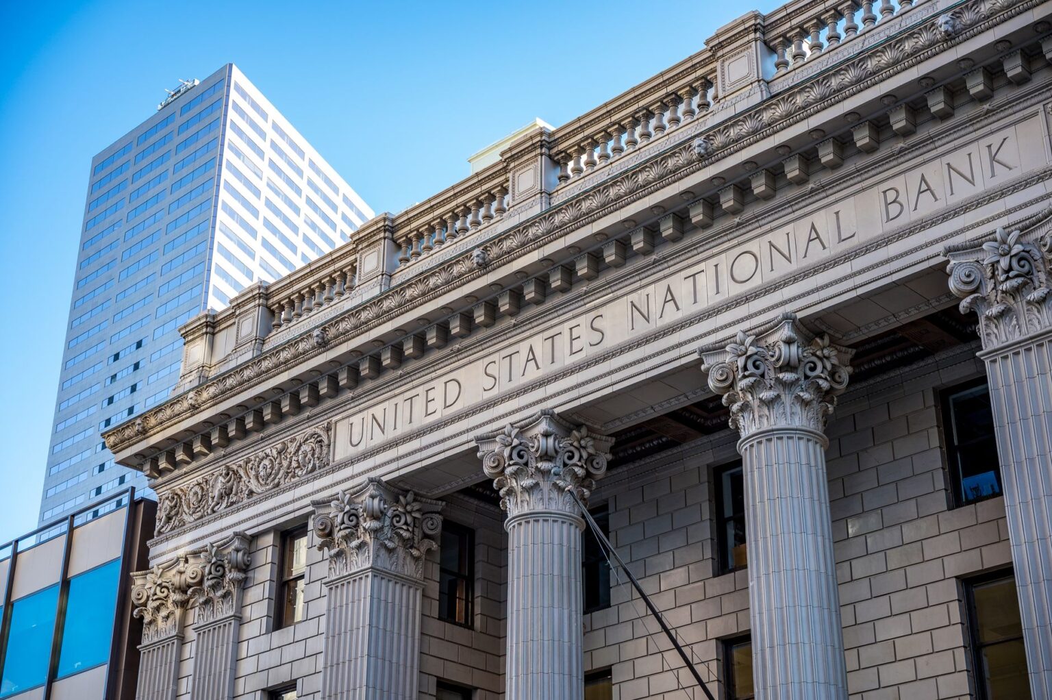 Subordinated Bank Debt Is Quietly Absorbing Regulatory Capital Stress Exterior view of a large commercial bank building representing institutional finance