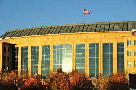Auction Rate Securities Are Quietly Repricing Municipal Liquidity Risk Stack of financial documents representing municipal bond instruments and auction rate securities