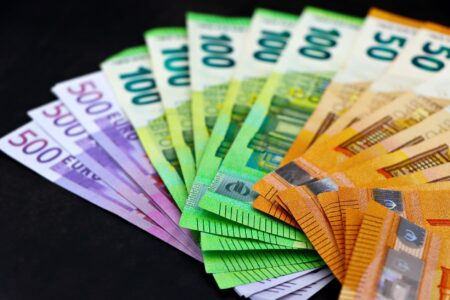 Financial documents and bond certificates representing municipal debt instruments