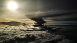 Dark storm clouds viewed from above representing catastrophic weather risk