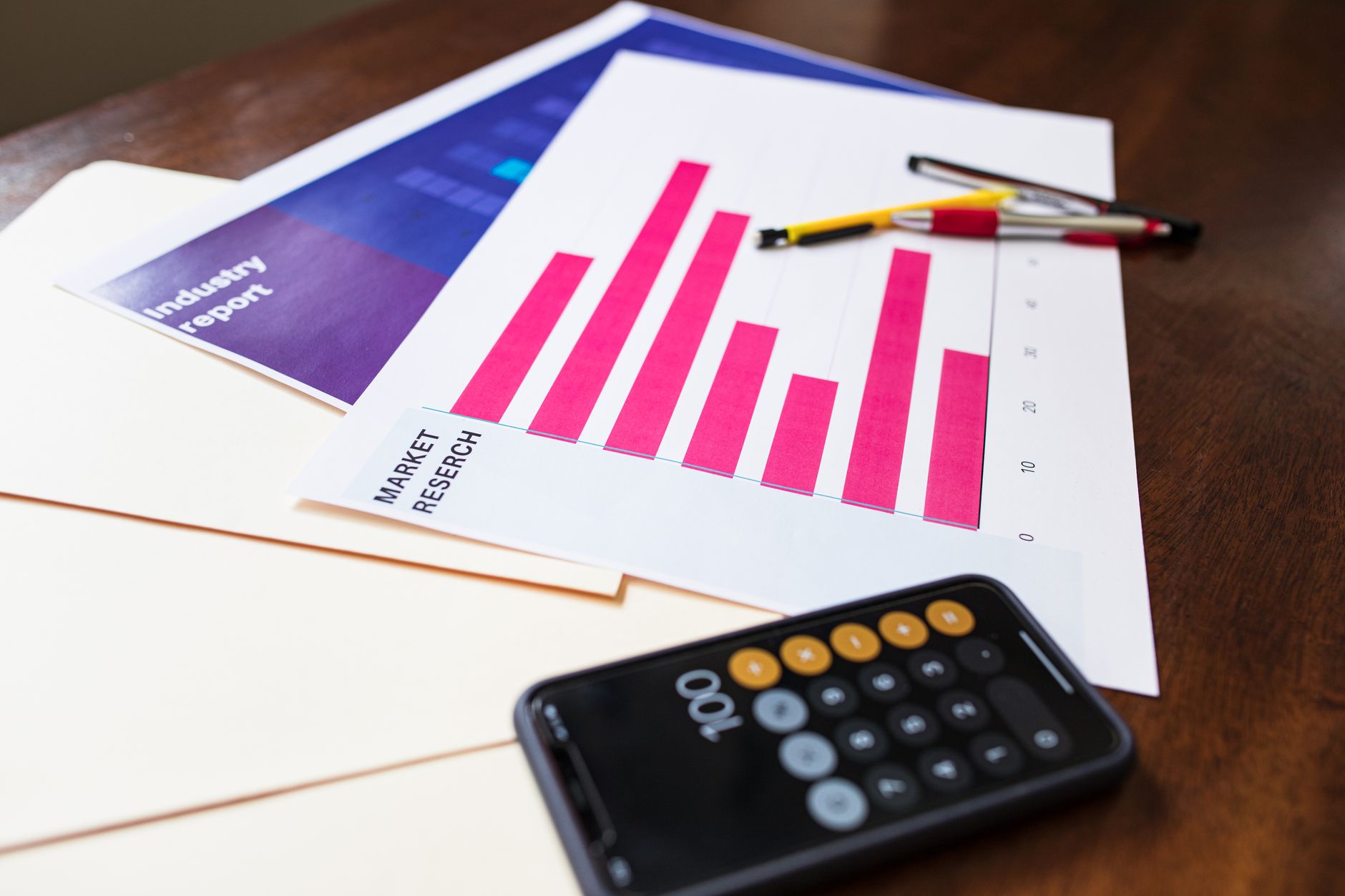 Financial analyst reviewing bond market data and liquidity metrics on desktop screens